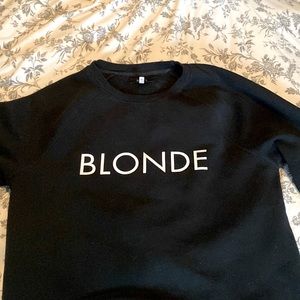 XL Brunette the label sweater. Blonde on front